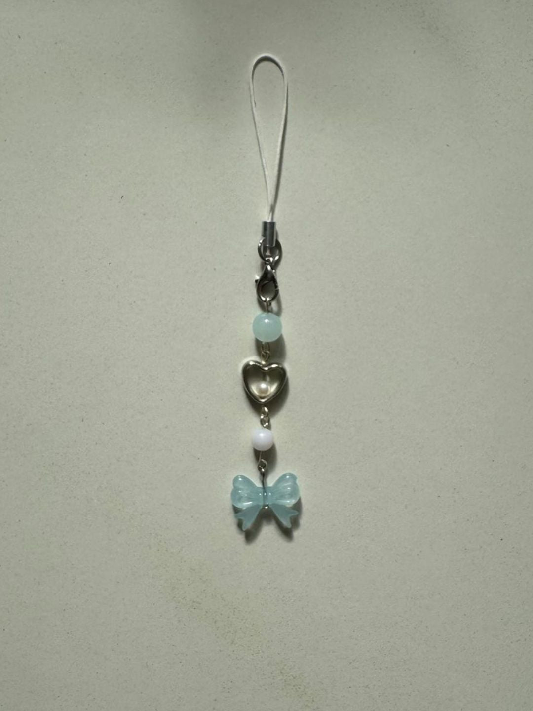 bow phone charm series 2 - blue